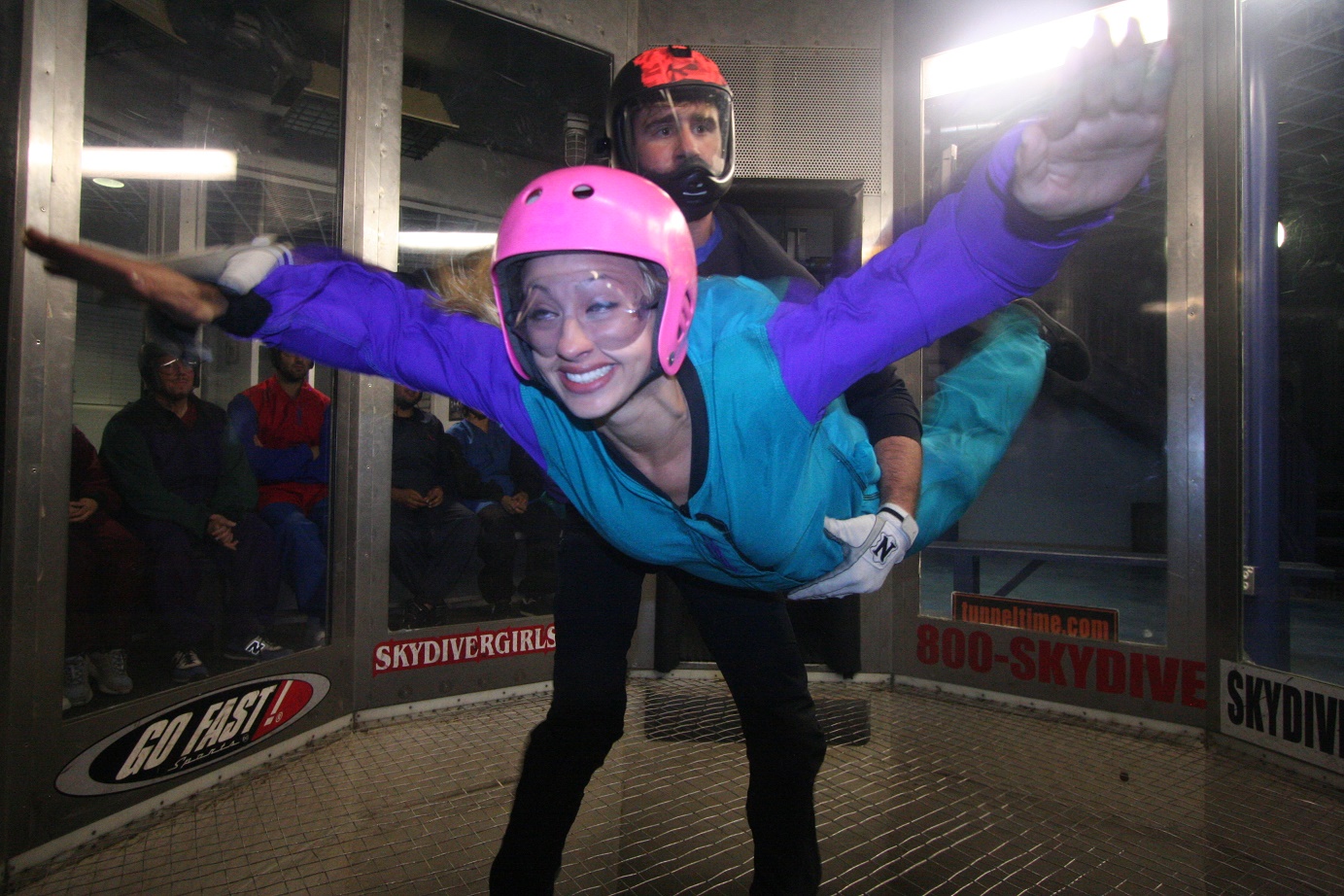 Woman indoor skydiving 
